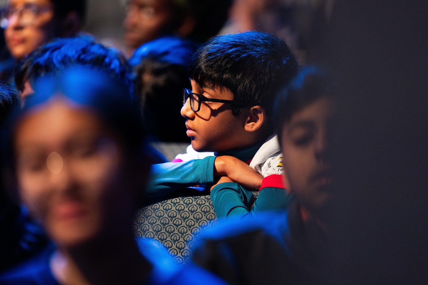 Photos of students competing for the Scripps National Spelling Bee trophy | iNFOnews.ca