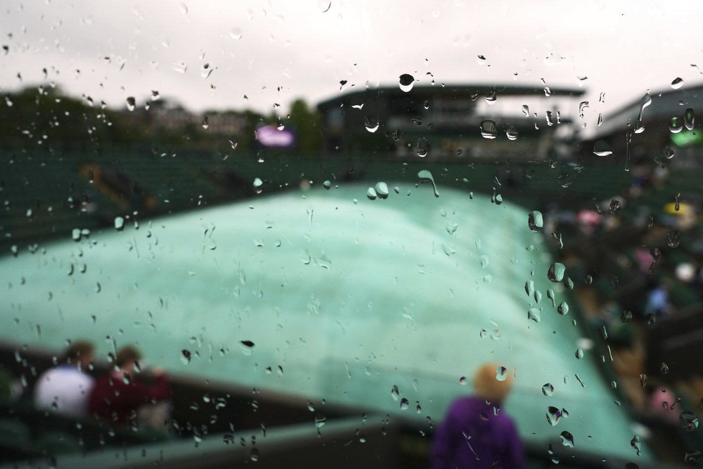 Photos show the rain on Day 3 after the Wimbledon heatwave | iNFOnews.ca