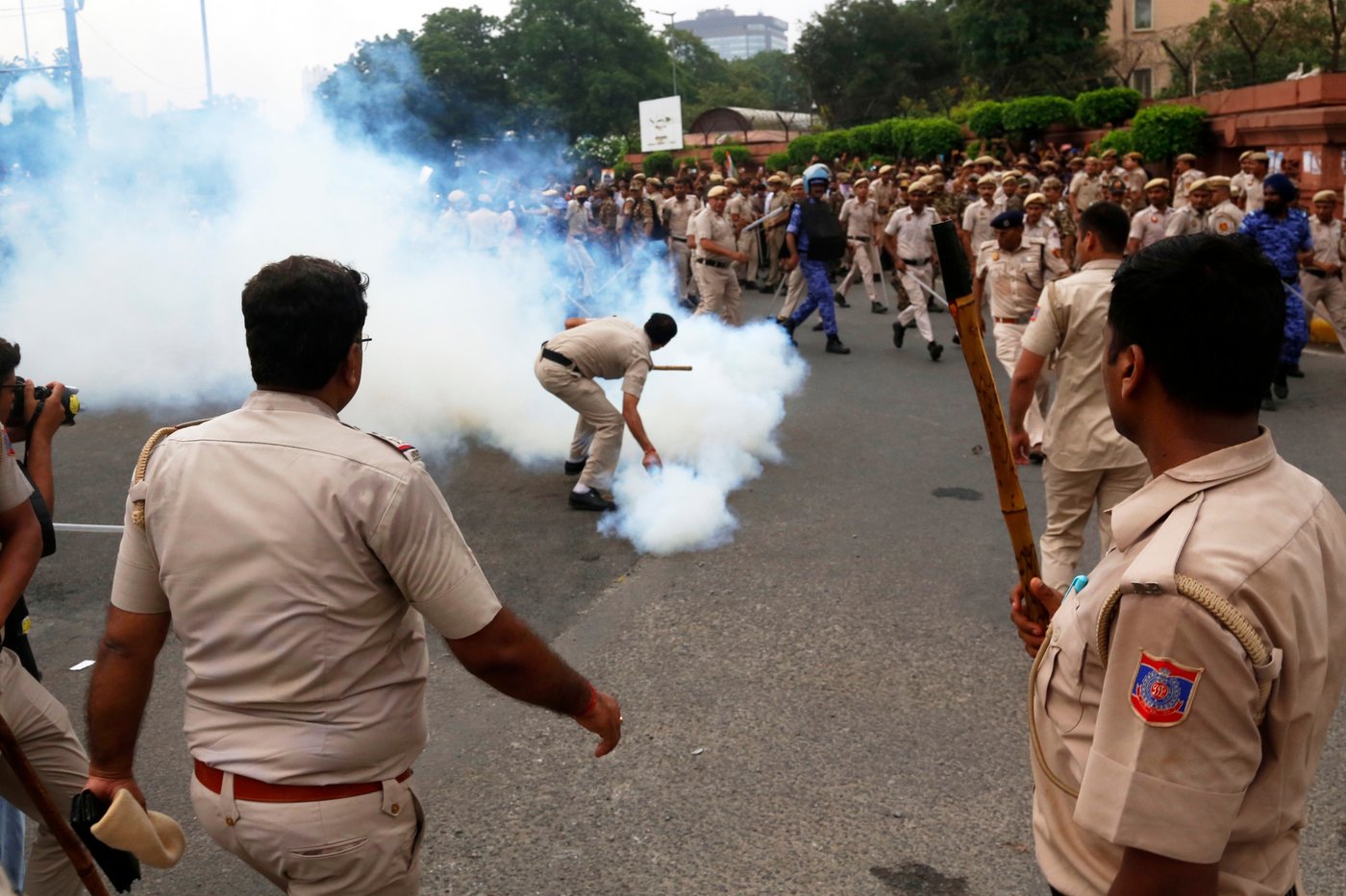 India police use tear gas to stop march on Parliament by Cockroach movement supporters | iNFOnews.ca