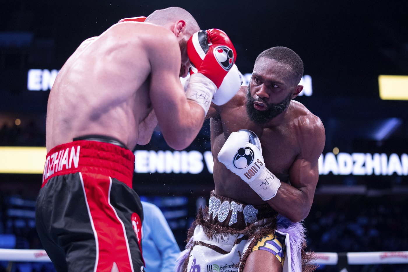 'Boots' Ennis defends welterweight championship with unanimous decision win over Chukhadzhian | iNFOnews.ca 'Boots' Ennis defends welterweight championship with unanimous decision win over Chukhadzhian | iNFOnews.ca