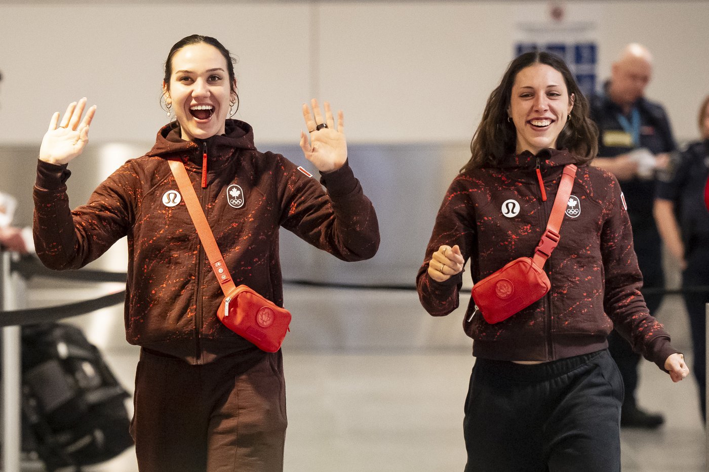 Photo Gallery: Canada's Olympians arrive home | iNFOnews.ca