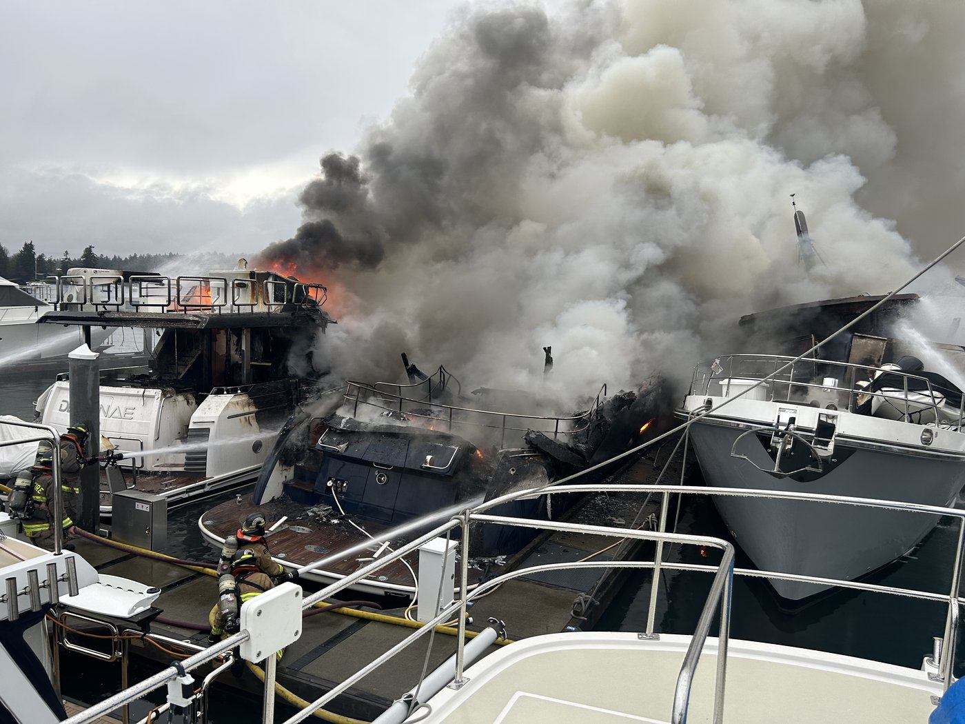 Fire chief says cause of fire that sank three yachts will likely never be found | iNFOnews.ca