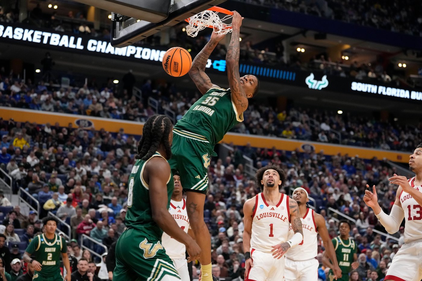 McKneely scores 23 and Louisville beats South Florida 83-79 in 1st round of NCAA Tournament | iNFOnews.ca