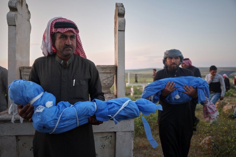 A grieving father buries his 6-year-old after a land mine kills 3 children in Syria's Idlib | iNFOnews.ca