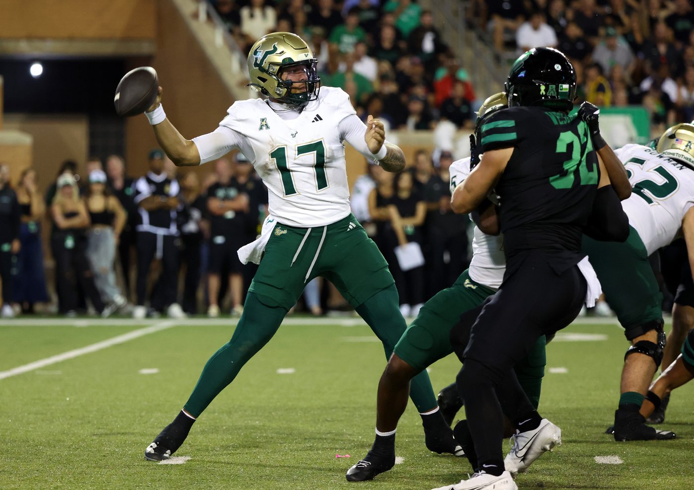 No. 24 South Florida scores 4 TDs in a 3 1/2-minute span and hands North Texas its 1st loss | iNFOnews.ca