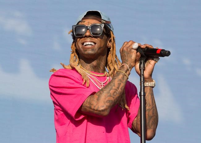 The Latest: Lil Wayne didn't perform due to police search | iNFOnews.ca