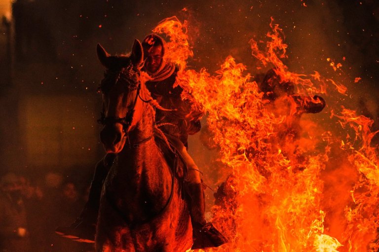 Photos of horses leaping through flames in centuries-old Spanish tradition | iNFOnews.ca