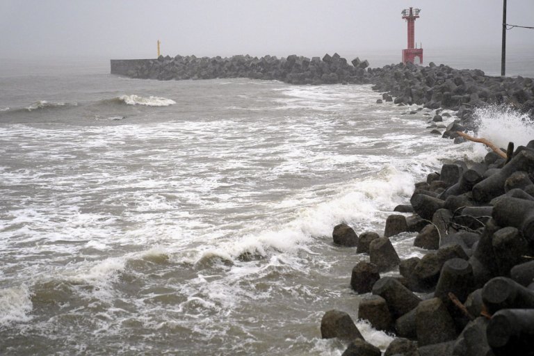 Two tropical storms pound Japan, causing flooding and landslides | iNFOnews.ca