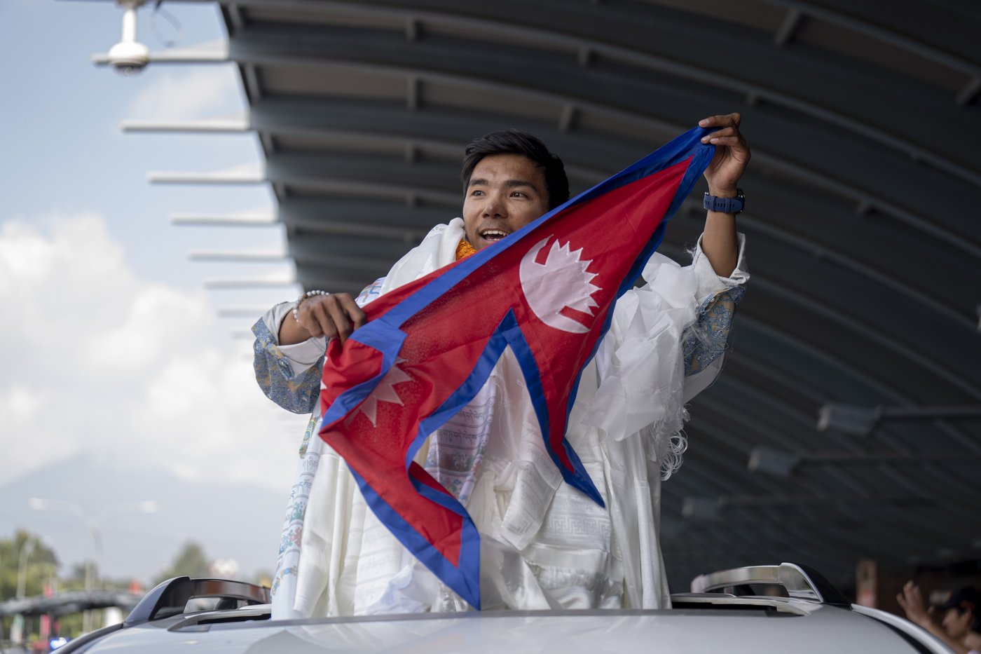 A record-setting teen climber returns home to Nepal to a hero's welcome | iNFOnews.ca