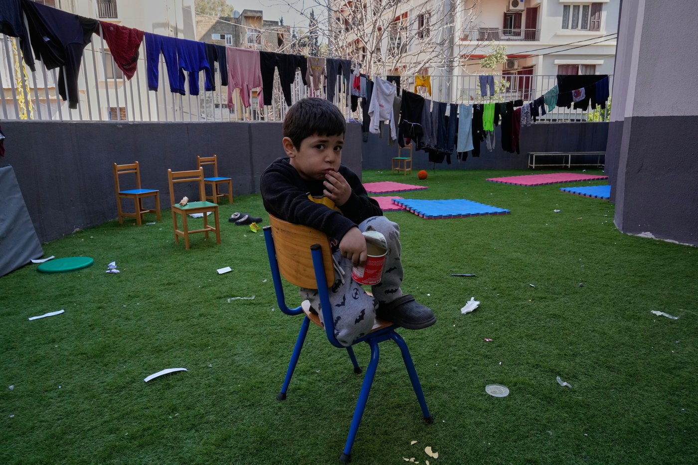 Photos of displaced civilians in Lebanon, where schools and stadiums turn into shelters during war | iNFOnews.ca