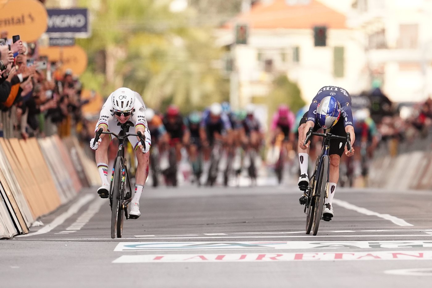 Bloodied and battered Pogacar fights back from a crash to finally conquer Milan-San Remo | iNFOnews.ca
