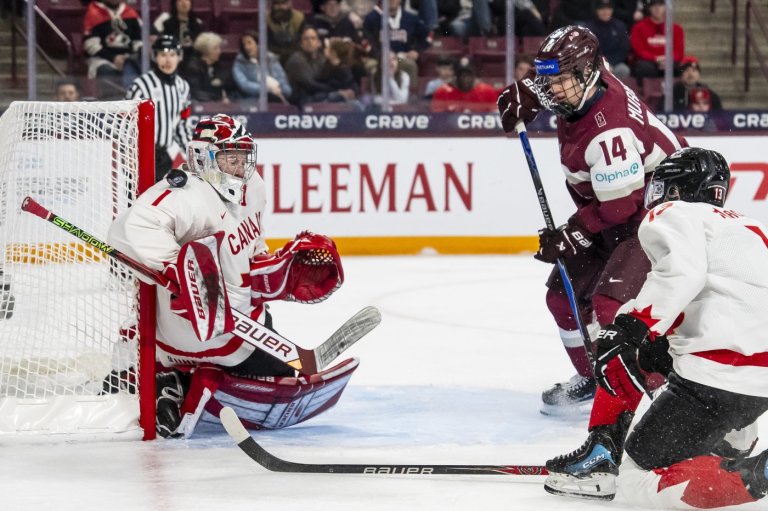 Hage scores in OT, Canada squeaks by Latvia 2-1 at world junior hockey championship | iNFOnews.ca