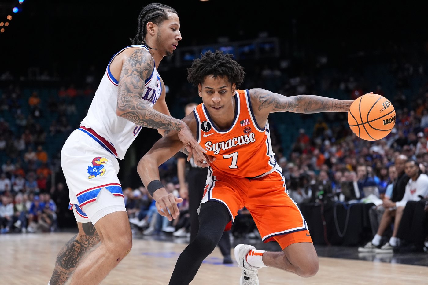 Double-doubles by Tre White and Flory Bidunga help Kansas beat Syracuse 71-60 at Players Era tourney | iNFOnews.ca