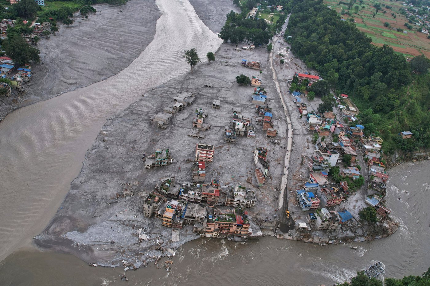 Photos show aftermath of flash floods in Nepal | iNFOnews.ca