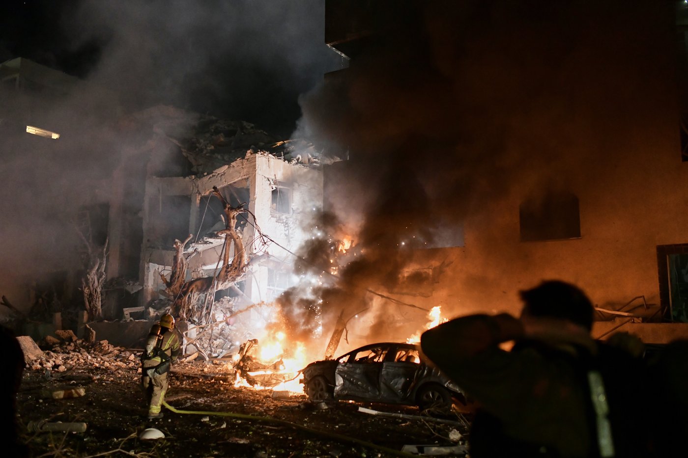 Photos show US-Israeli strikes and Iran's response | iNFOnews.ca