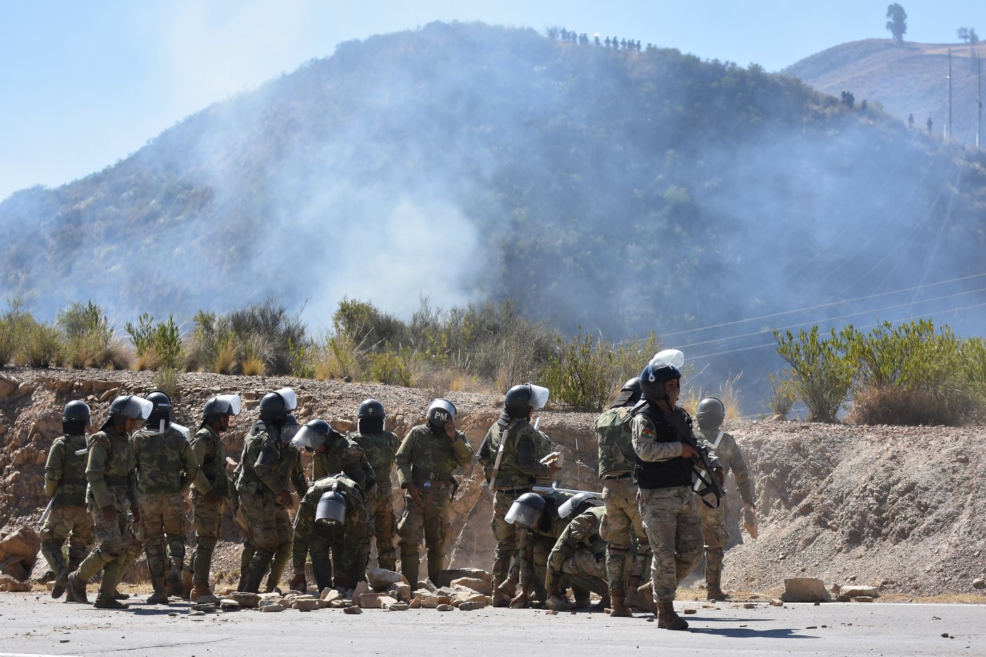 Bolivia clears anti-government roadblocks after emergency decree, as patrol plane crash kills 6 | iNFOnews.ca