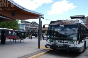 A bus arrives at a bus depot in Kelowna.