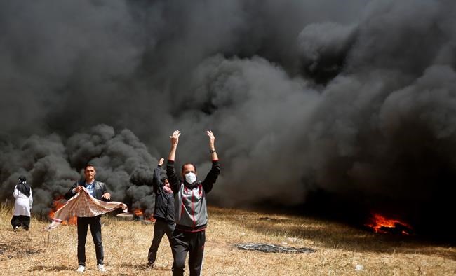 The Latest: Palestinian journalist dies from gunshot wounds | iNFOnews.ca