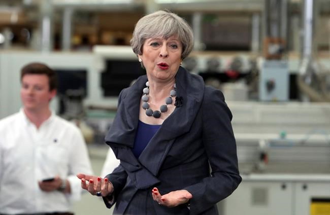 UK's May urged to take tougher line against Trump on climate | iNFOnews.ca