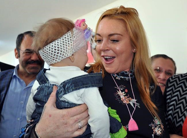 Lindsay Lohan visits Syrian refugees in southeast Turkey | iNFOnews.ca CP741612266