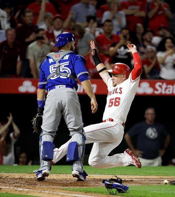 Bautista homers in 13th, Blue Jays escape jam to beat Angels | iNFOnews.ca