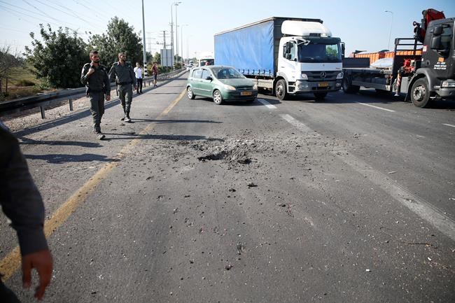 The Latest: 8 die as Israeli planes hit Gaza | iNFOnews.ca