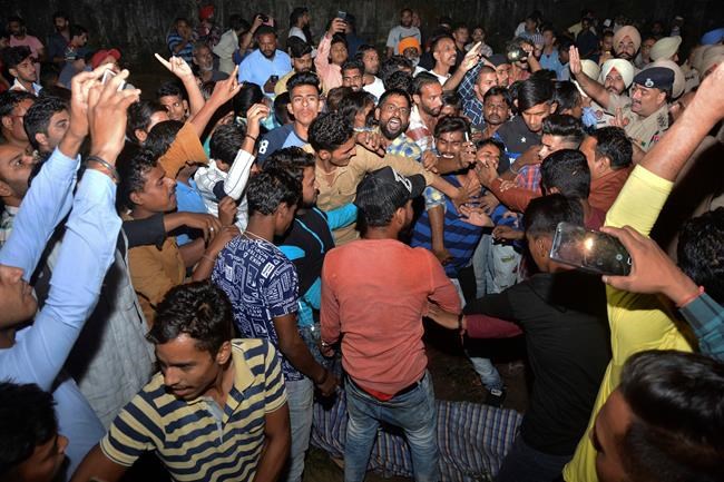 Train mows down crowd at India festival, at least 58 dead | iNFOnews.ca
