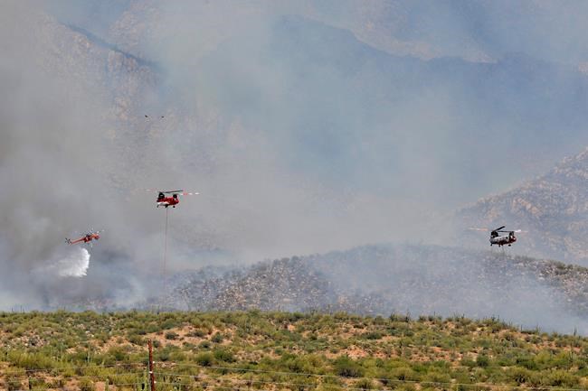 Firefighters grapple with triple-digit heat against wildfire | iNFOnews.ca