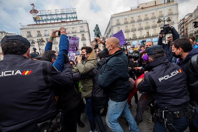 Defying pandemic, feminists in Spain decry far-right attacks | iNFOnews.ca Defying pandemic, feminists in Spain decry far-right attacks | iNFOnews.ca