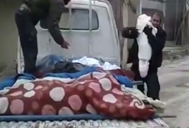 In Syria, a father says last goodbye to dead child | iNFOnews.ca In Syria, a father says last goodbye to dead child | iNFOnews.ca