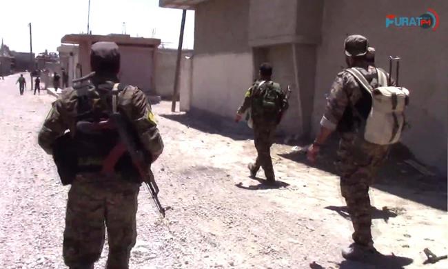 US-backed Syrian fighters link up from east, west in Raqqa | iNFOnews.ca