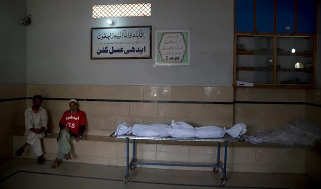 At Pakistan mortuary, unclaimed bodies and frantic relatives | iNFOnews.ca At Pakistan mortuary, unclaimed bodies and frantic relatives | iNFOnews.ca
