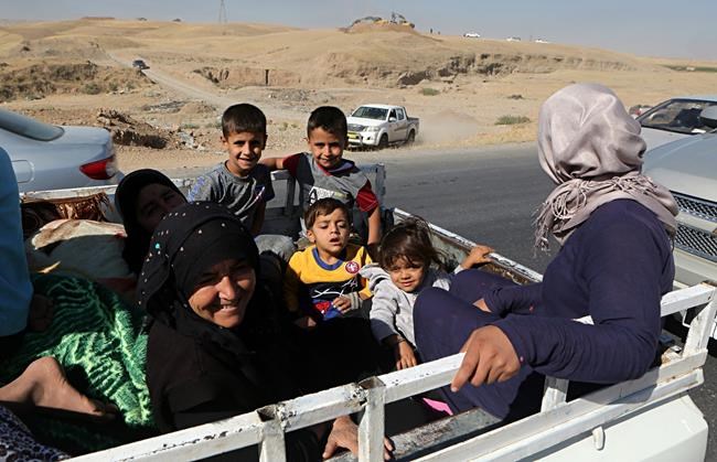 Iraqi gov't assumes control after Kurds leave disputed areas | iNFOnews.ca