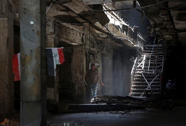 Baghdad authorities clear site of deadly mall bombing | iNFOnews.ca