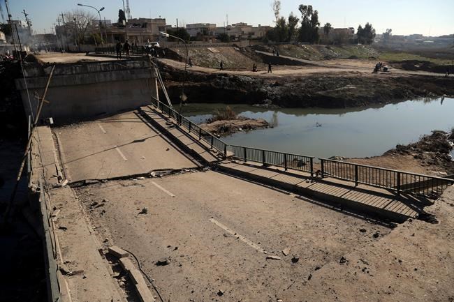 Iraqi forces in IS battle raise flag over Mosul University | iNFOnews.ca CP173767845