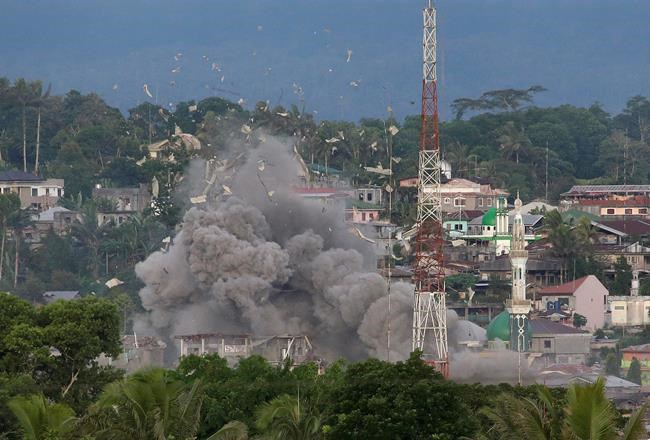 IS galvanized in Asia by Philippine city siege, report says | iNFOnews.ca