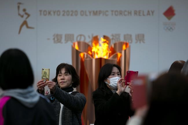 Tokyo Olympic flame taken off display; next stop unclear | iNFOnews.ca