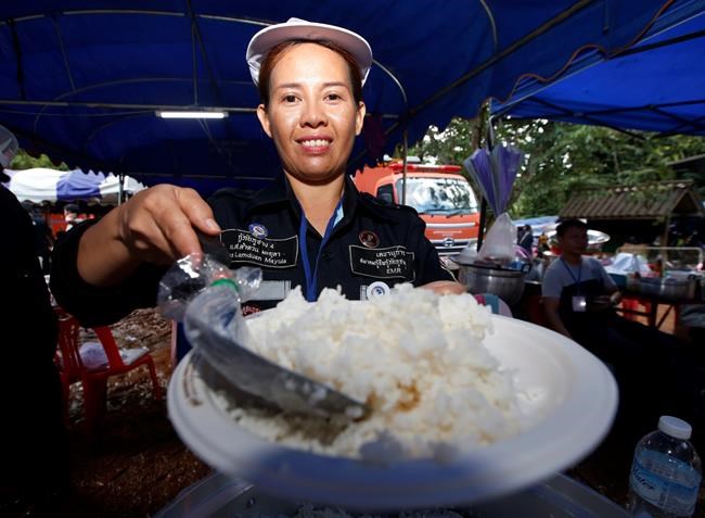 'I beg skies to show mercy': Thais rally behind cave rescue | iNFOnews.ca CP658799443