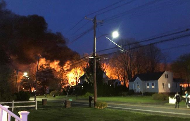 The Latest: Woman held hostage, escaped before explosion | iNFOnews.ca