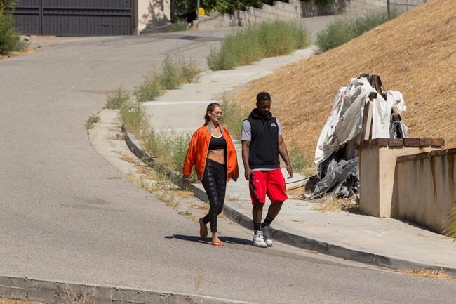 After lengthy stand-off with police, Chris Brown arrested | iNFOnews.ca