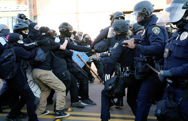 Trump supporters, counter-protesters clash in San Diego | iNFOnews.ca CP2005571267