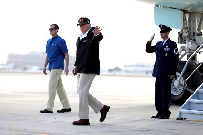 The Latest: Trump tours wildfire-ravaged Malibu area | iNFOnews.ca CP183399749
