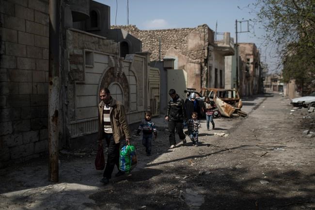 As Mosul fighting rages, a family tries to come back home | iNFOnews.ca As Mosul fighting rages, a family tries to come back home | iNFOnews.ca