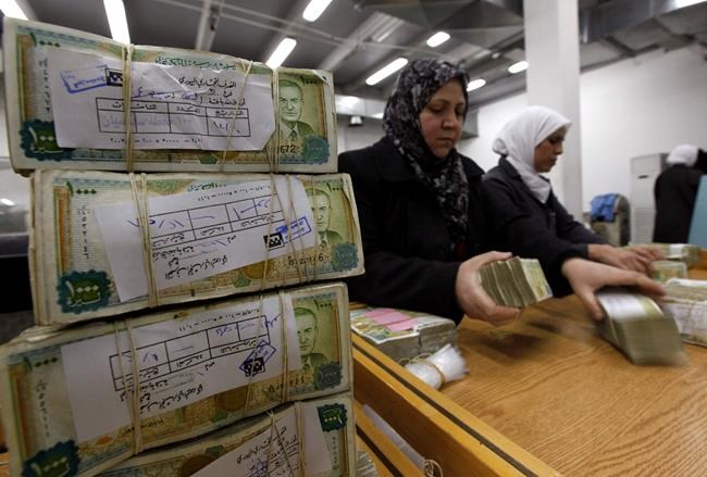 Syrian president decrees financial stimulus amid crisis | iNFOnews.ca