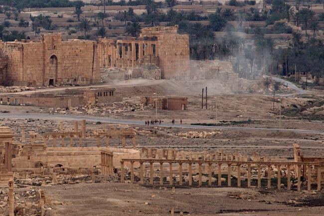 The Latest: Syria unveils new Hama statue to Assad's father | iNFOnews.ca