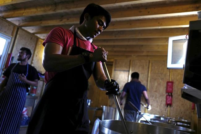 Minister says French migrant camp to be dismantled, no date | iNFOnews.ca