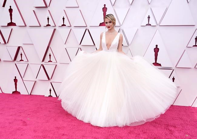 The Oscars bring back red carpet glam in whites, reds, gold | iNFOnews.ca