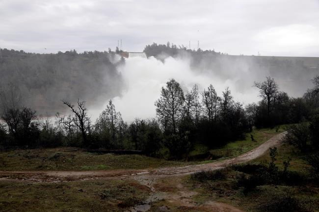 The Latest: Report says rain contributed to damage at dam | iNFOnews.ca CP215624073