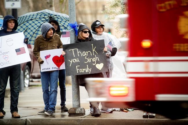 Slain police officer called 'American hero' at his funeral | iNFOnews.ca