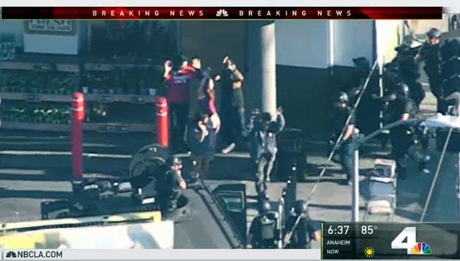The Latest: Authorities say 1 killed in LA market standoff | iNFOnews.ca